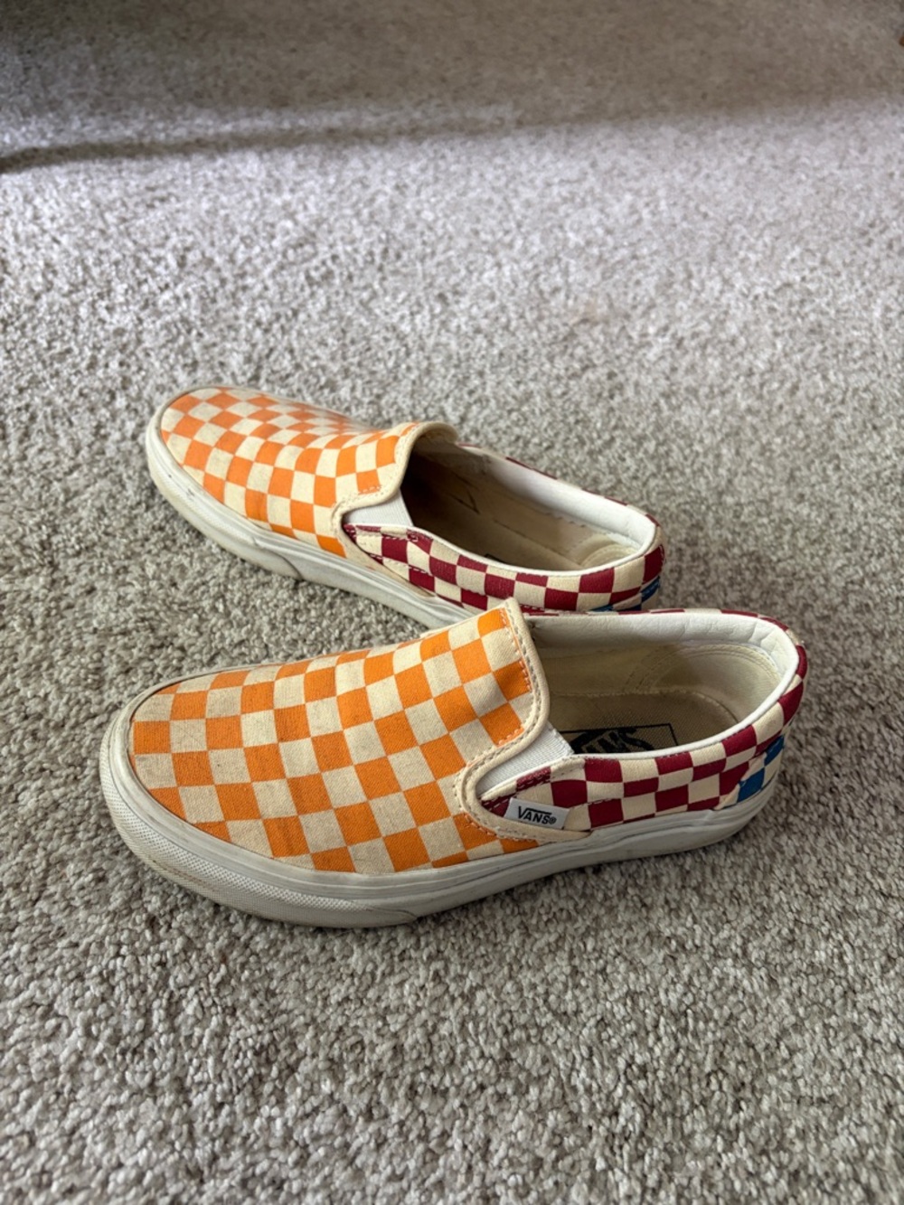 Vans Slip-On Checkerboard Sneakers in Orange & Red